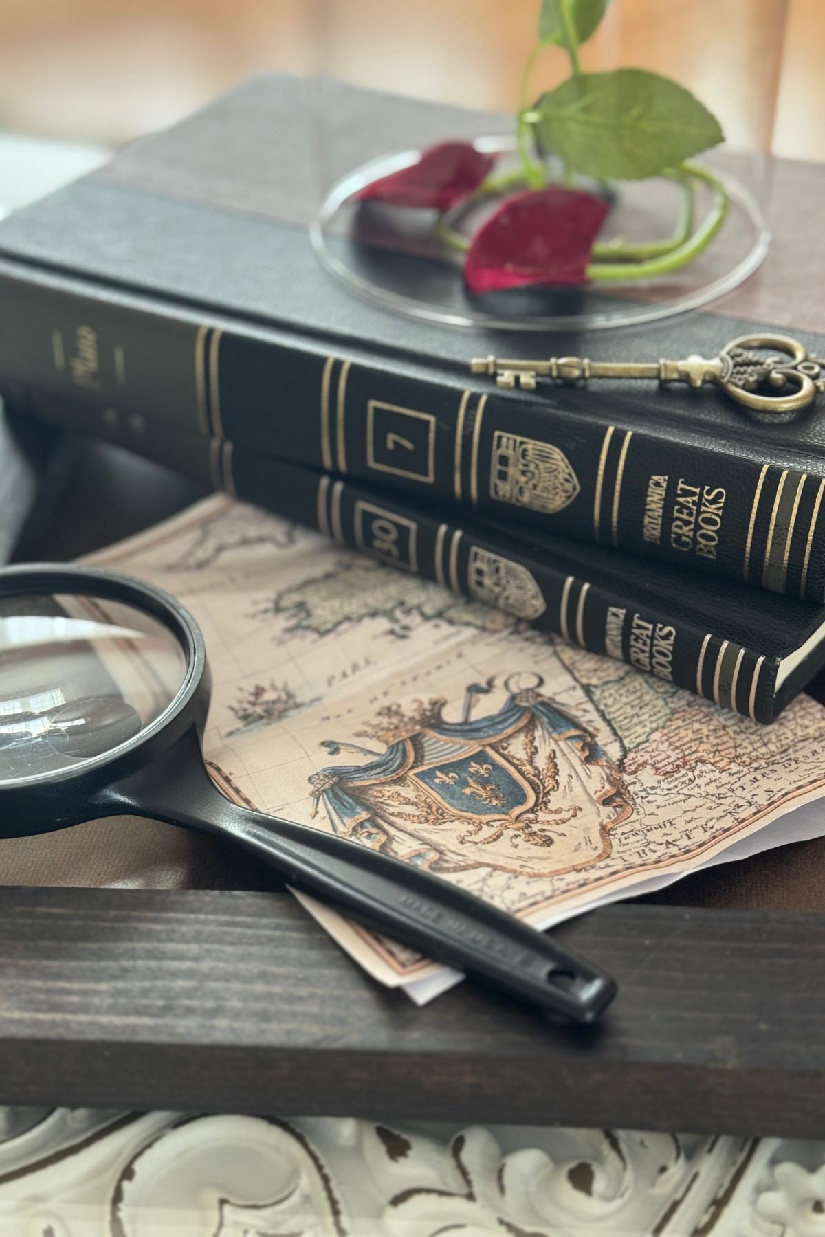 18th century style map and a magnifying glass