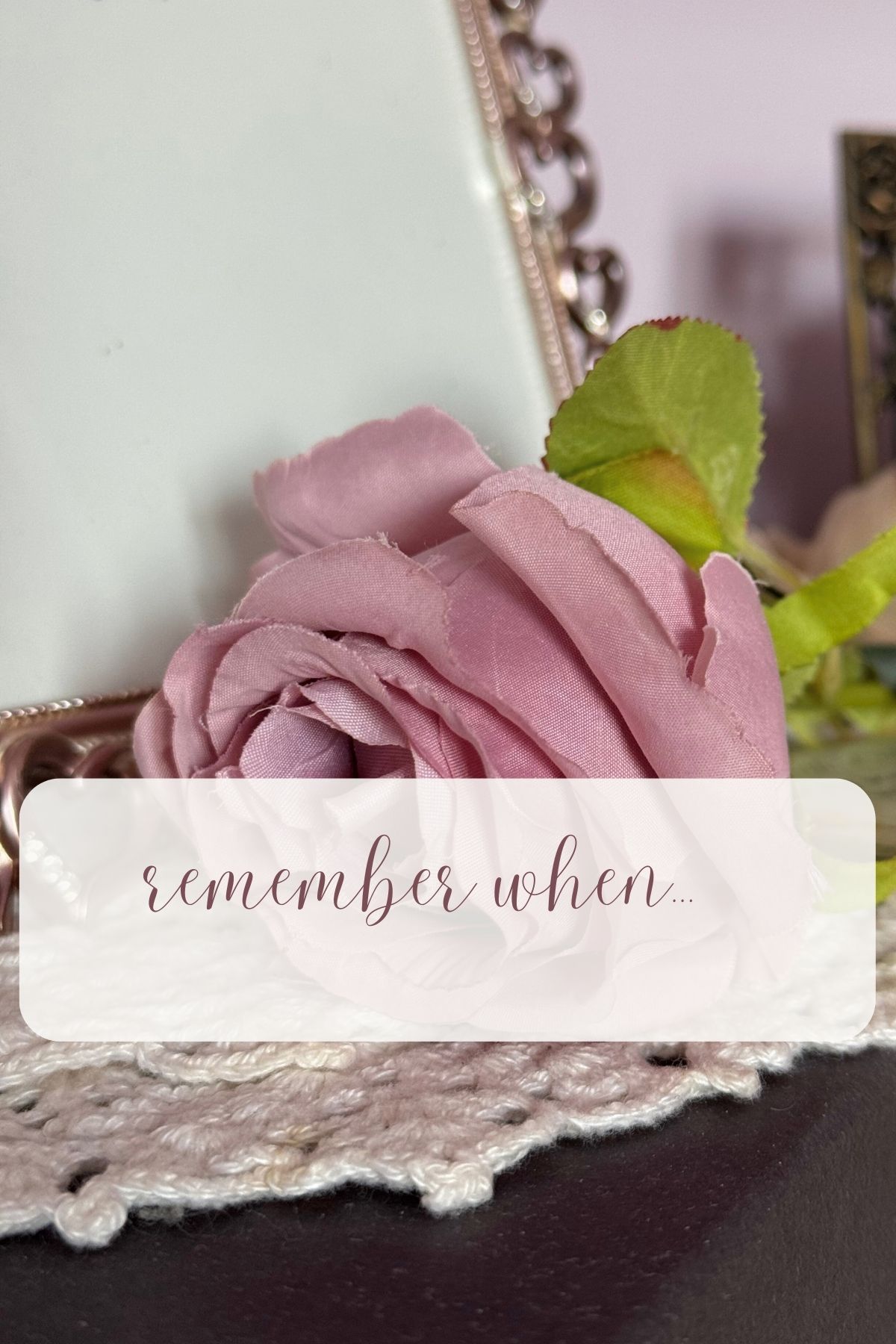 Remember when. a mauve rose on a doily