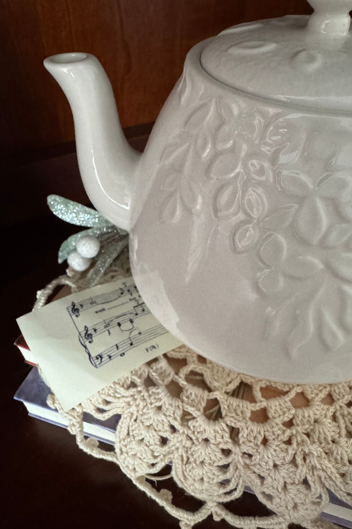 Moonlight serenade sheet music strip under a teapot