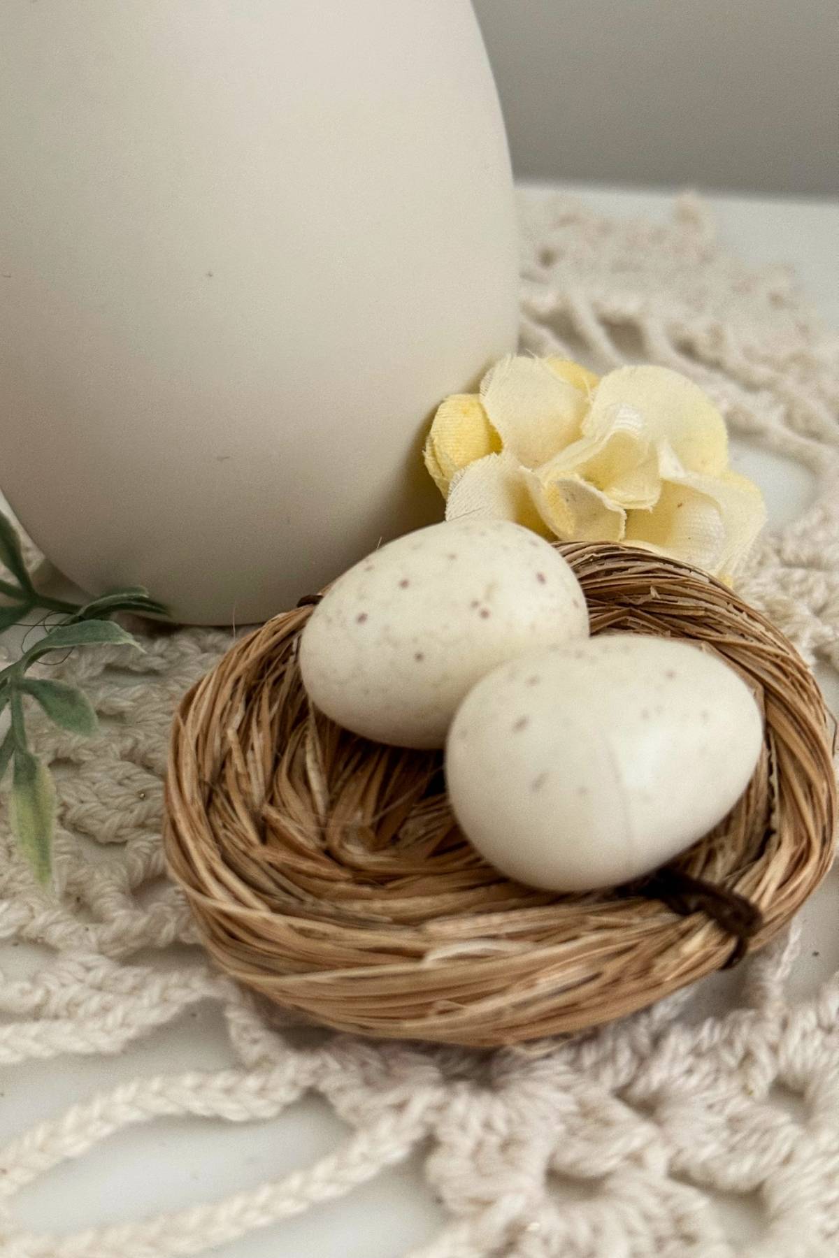 spring decor with cream and sage (1) Small decorative nest with speckled eggs on a crocheted runner for a subtle spring touch