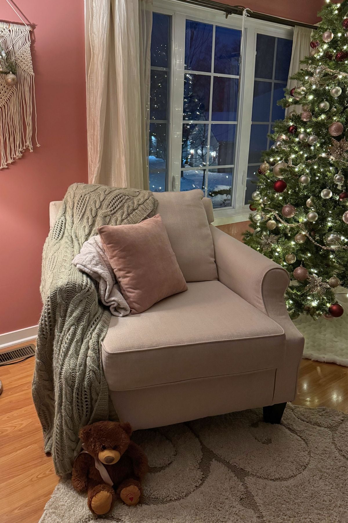 Reading nook in the Christmas living room Reading nook in the Christmas living room. Sage throw blanket, dusty pink throw pillow.
