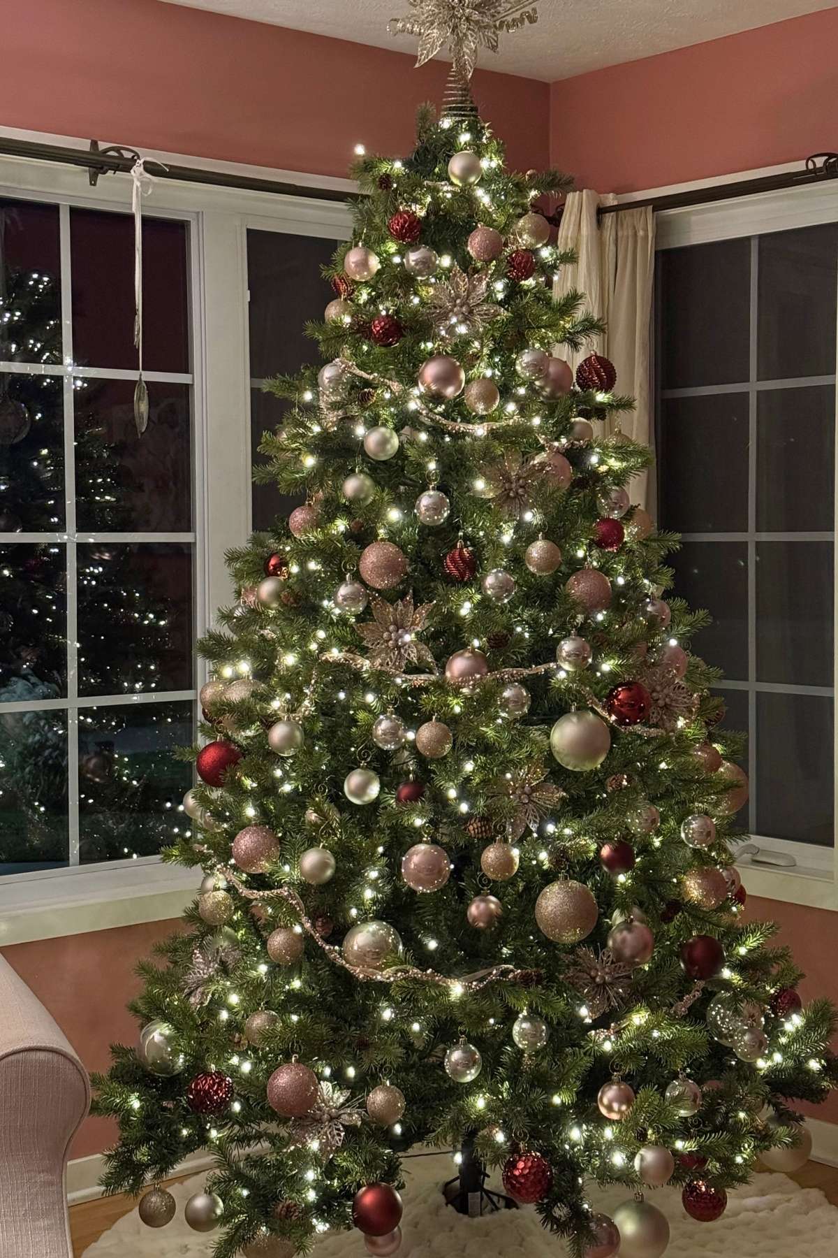 champagne blush pink and mulled wine Christmas tree (1) Storybook Cottage Christmas tree with blush, champagne, and burgundy ornaments and a cream tree skirt