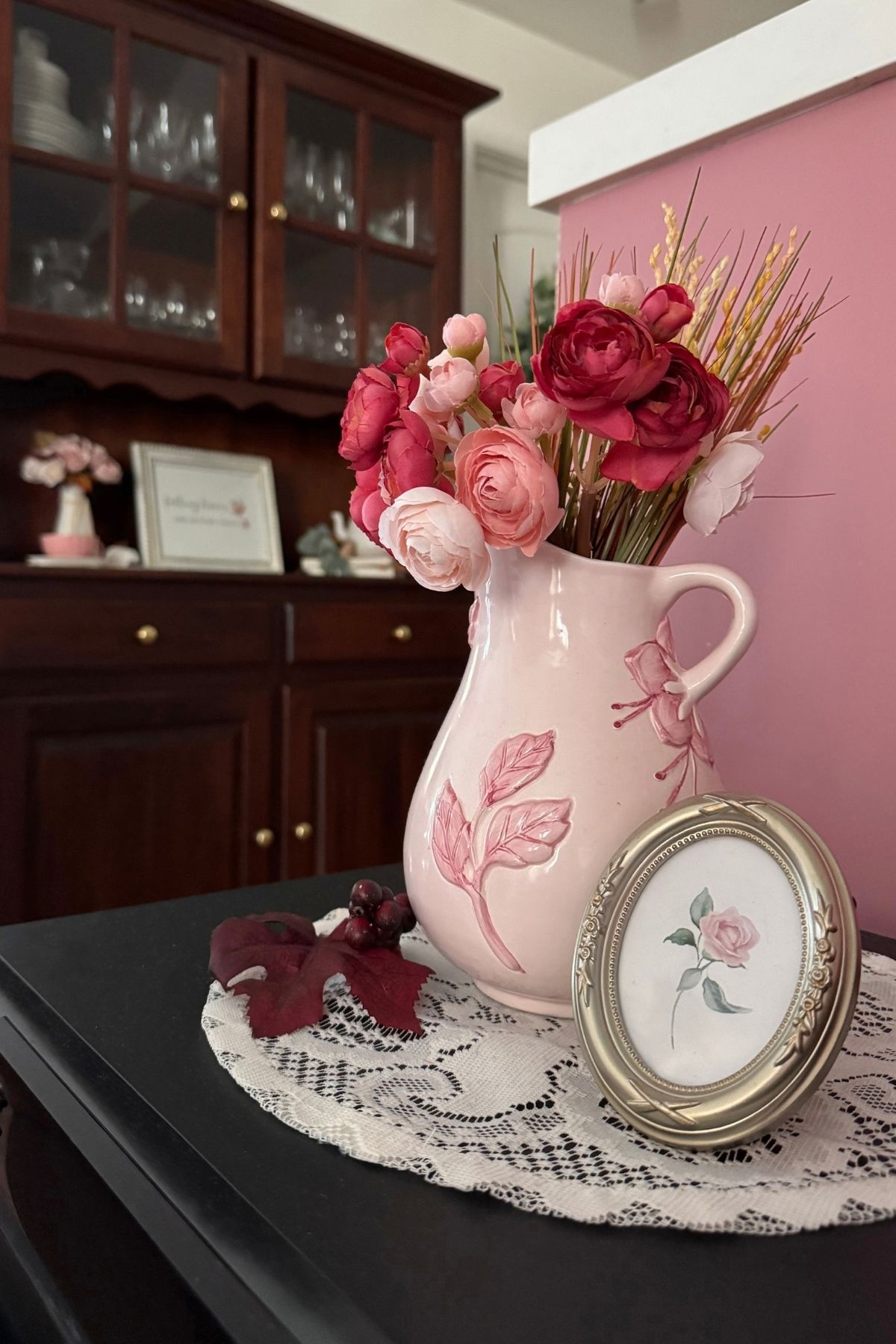 autumn florals in a pink pitcher Autumn florals: blush pink and burgundy ranunculus in a pink pitcher